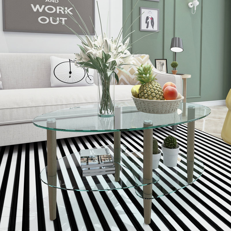 Table basse transparente en verre ovale, table moderne dans le salon