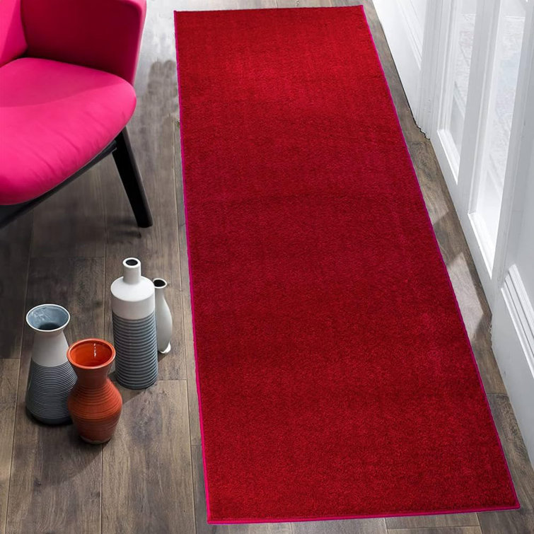 Tapis antidérapant de couleur rouge à taille ajustable pour l'intérieur