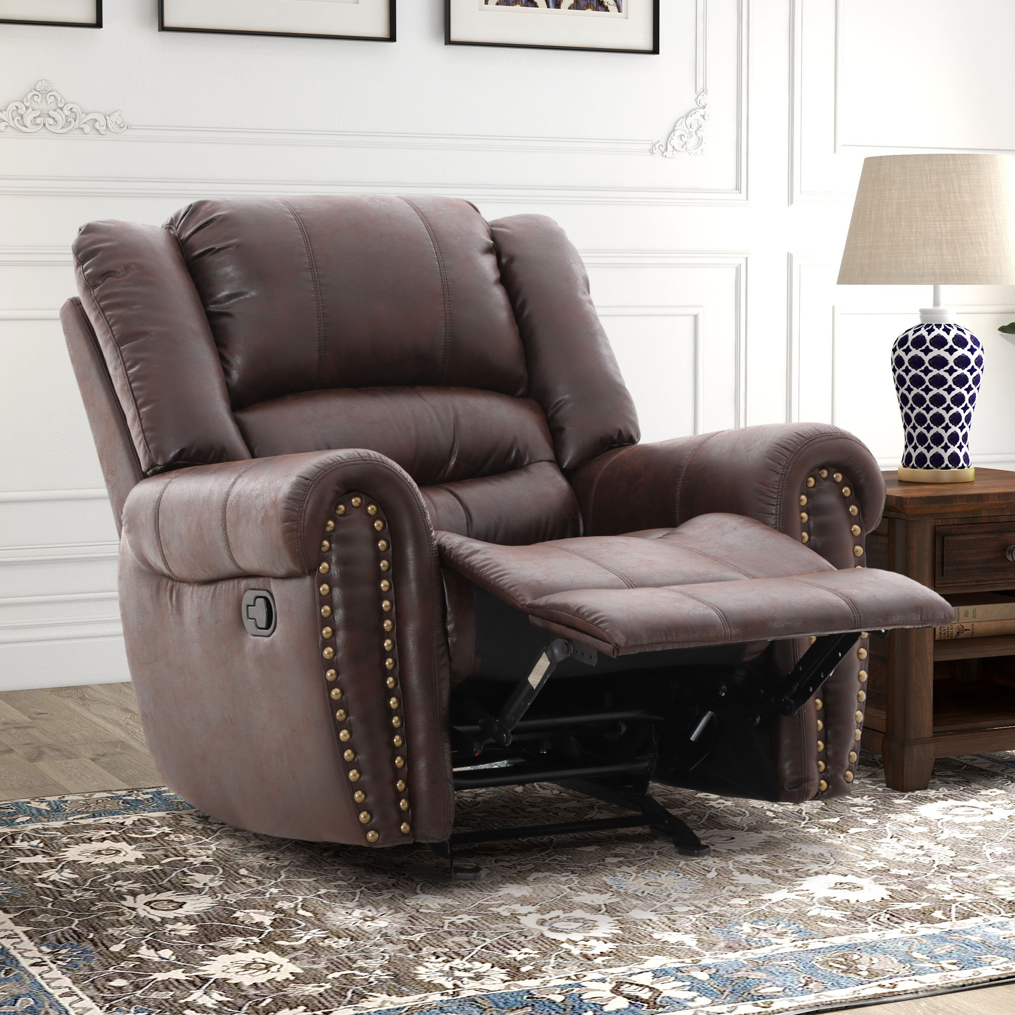 https://assets.wfcdn.com/im/33445177/compr-r85/2622/262231407/405-wide-classic-and-soft-vegan-leather-manual-rocker-recliner-with-nailhead-trim.jpg