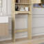 Armoire de rangement au-dessus de la toilette
