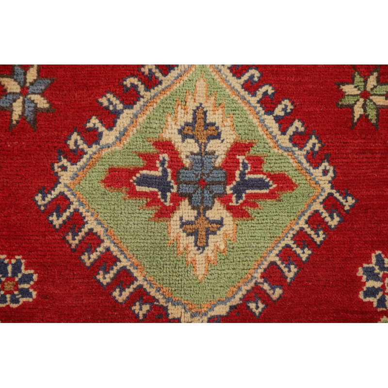 Tapis rouge à motif oriental Kazak