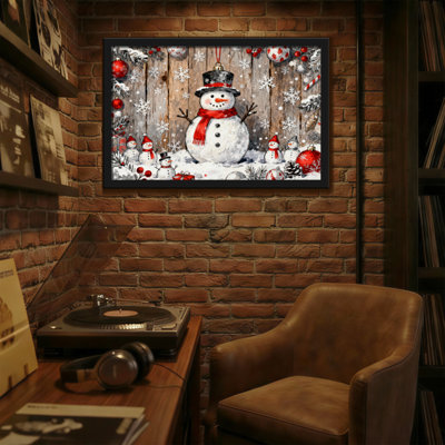 Bonhomme de neige de Noël avec foulard et chapeau rouges