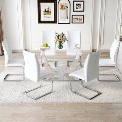 Ensemble de table et de chaises. Table de salle à manger moderne, plateau de table en verre trempé et pieds de couleur argent. Combiné avec une chaise en polyuréthane doux et confortable, parfait pour le dîner, les réunions, la maison et le bureau.