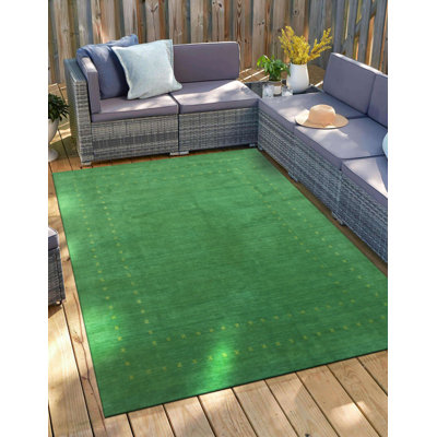 Tapis transitionnel en laine fabriqué à la main vert Dreher