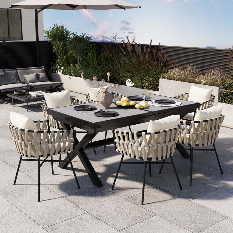 Discover Unmatched Flexibility In Alfresco Dining With Six Creatively Arranged Chairs Made Of Polyester Woven Tape And A Table That Expands From 62.9 To 82.6 Inches To Suit Any Occasion.