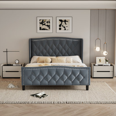 Mirabai Upholstered Metal Wingback Bed
