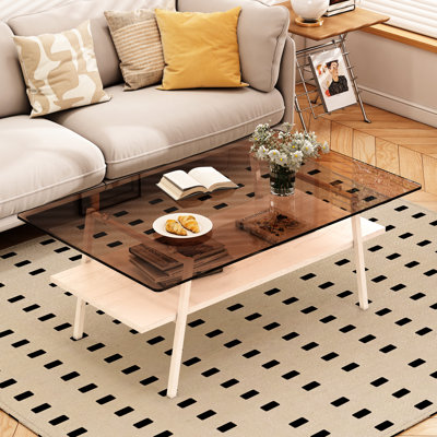 Table basse moderne marron avec dessus en verre trempé et structure en métal, 99,7 cm de long x 56,6 cm de large x 42,8 cm de hauteur, pieds couleur chair, 99,7 cm L x 56,6 cm l x 42,8 cm H