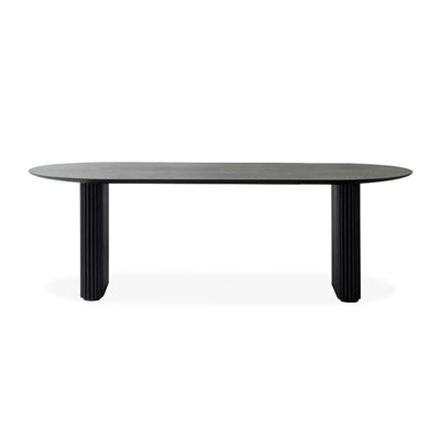 Black oval-shaped solid wood desk