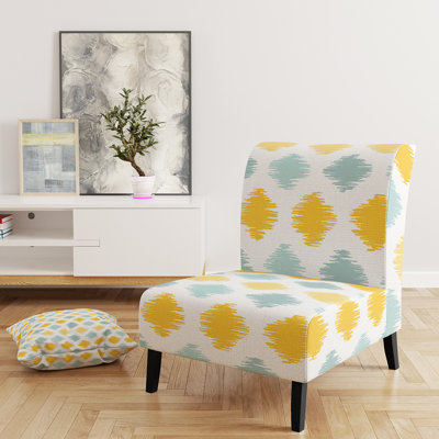 Fauteuil de chambre à motif géométrique jaune et bleu revêtu de velours