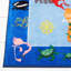 Tapis bleu à motif graphique-26307050