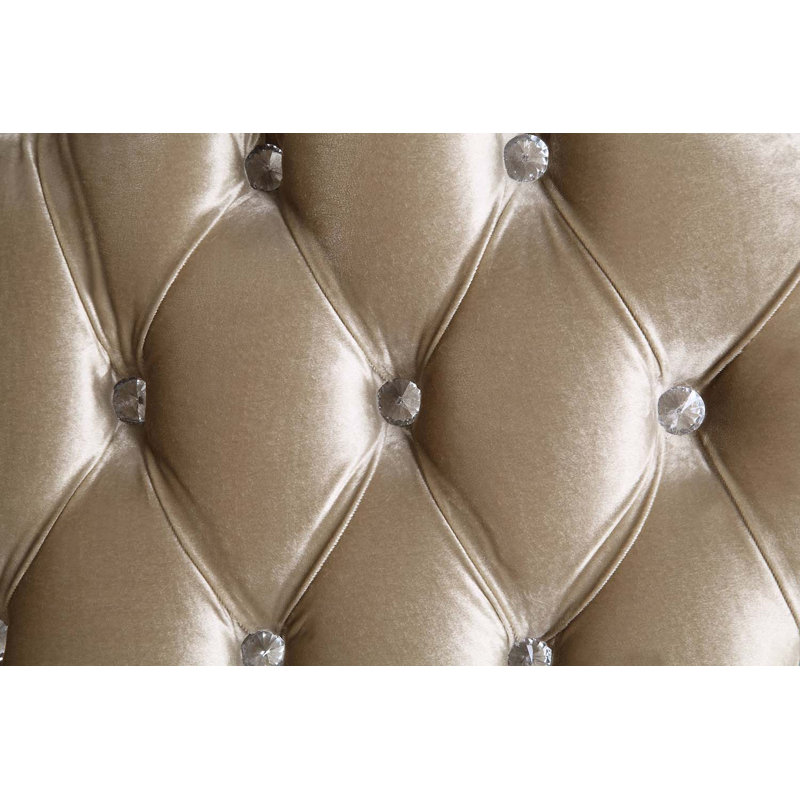 Antique White Tufted Sofa with Floral Cushions and Nailhead Trim