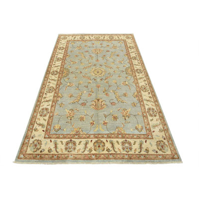 Tapis unique bleu de 6 pi 1 po x 9 pi 3 po