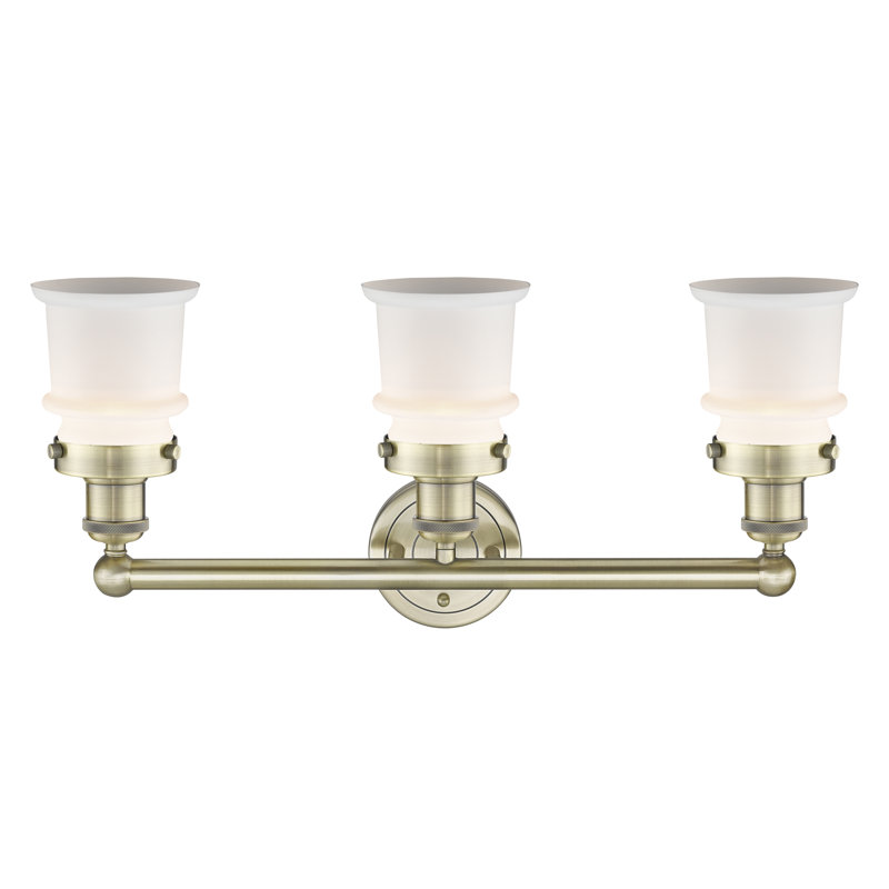 Petit luminaire pour salle de bain 3 lumières Cailen de la collection Edison, Blanc mat, Laiton antique