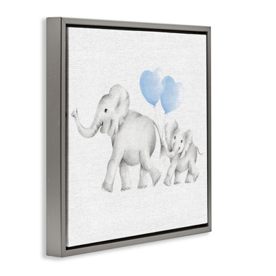 Famille d'éléphants avec des ballons