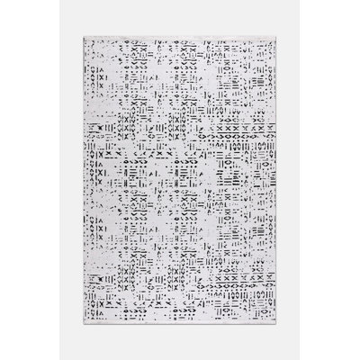 Tapis blanc en polyester antidérapant Luxia facile à nettoyer