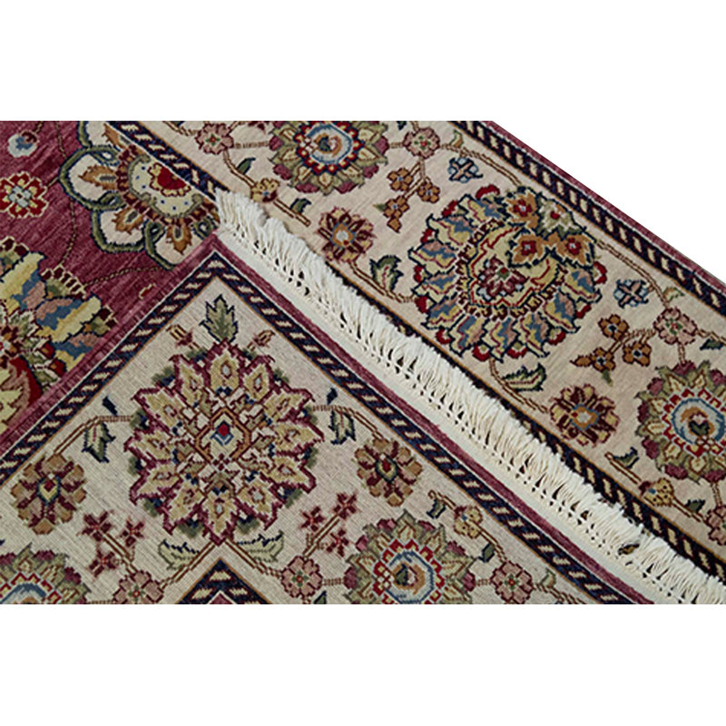 Tapis rose et ivoire de haute qualité noué à la main