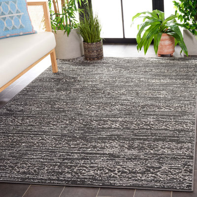 Tapis d'intérieur / extérieur à motif géométrique Jolisha Performance