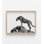 Guépard sur un rocher - reproduction de photographie de la faune en noir et blanc