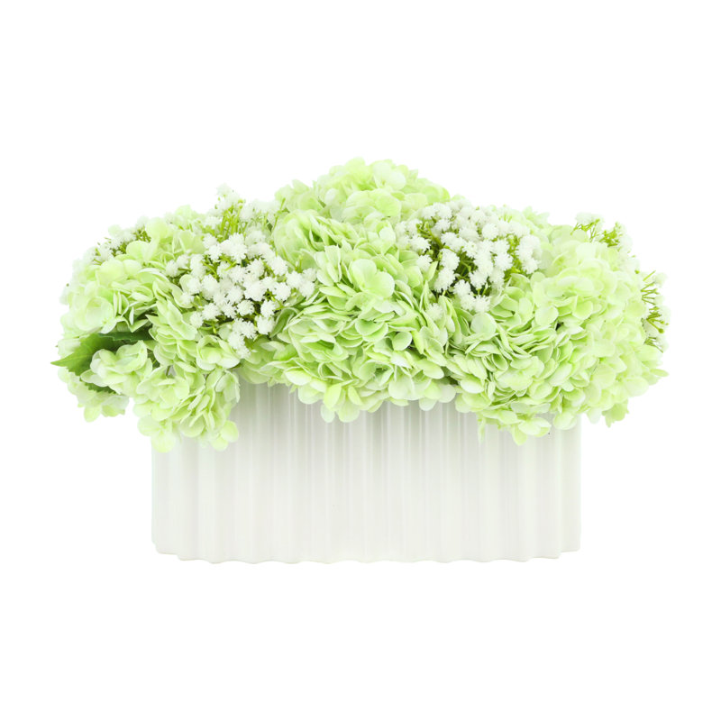 Baby's Breath and Hydrangeas Arranged in Ceramic Vase