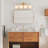 Dimmable Opal Glass Armed Sconce