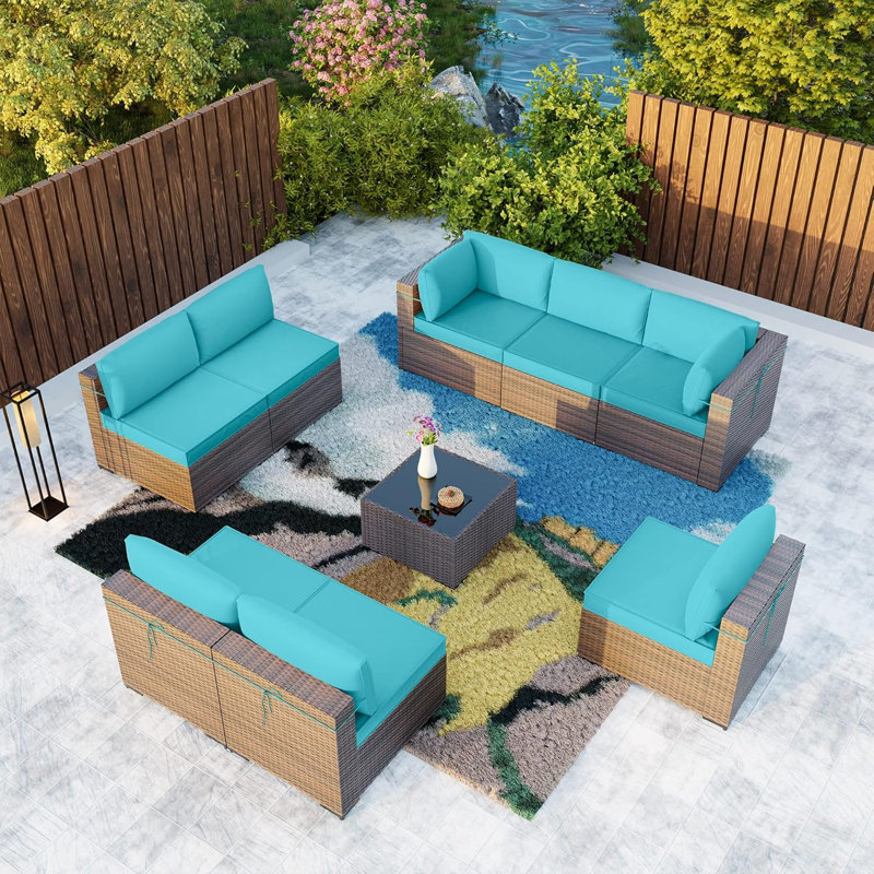 Yasmina 9-Piece Rattan Sectional Seating Group with Cushions And Tempered Glass Table, Green