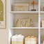 Système d'organisation modulaire blanc avec rangement à 7 tablettes et 8 tiroirs