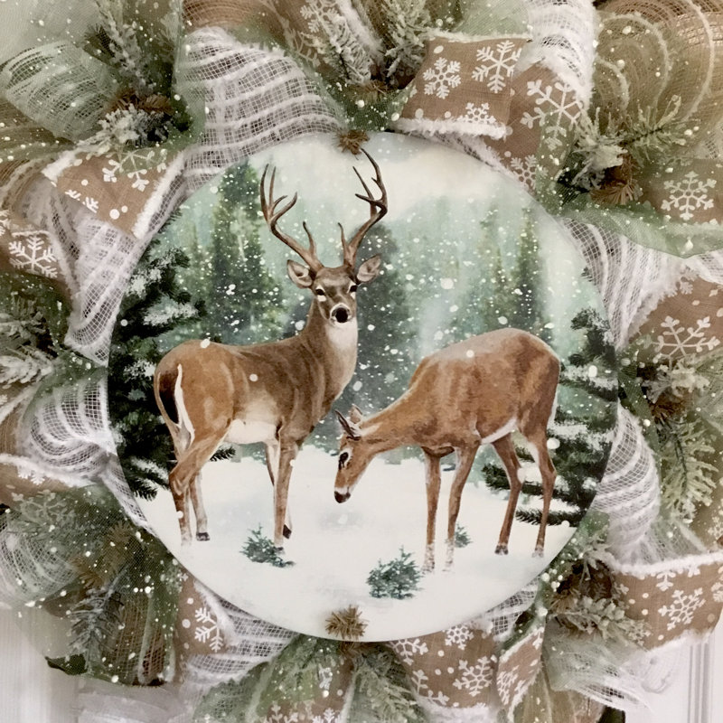 Couronne d'hiver avec rassemblement de cerfs