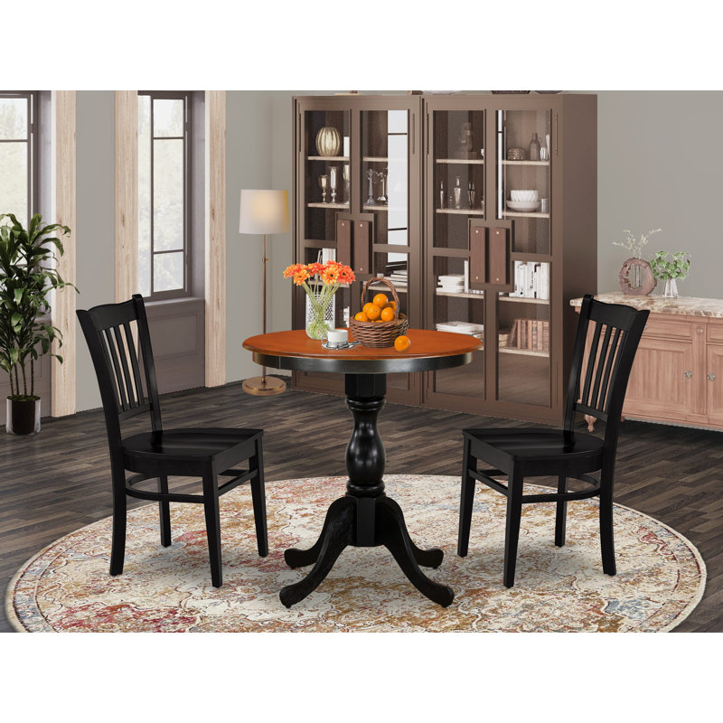 L'ensemble de mobilier de salle à manger 3 pièces comprend une table ronde avec piédestal et 2 chaises en bois, noir et cerise