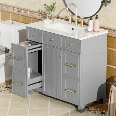 Meuble-lavabo bleu 36 po avec lavabo en céramique, cadre en bois massif, portes à fermeture en douceur et nombreuses solutions de rangement