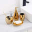 Ensemble d'accessoires de salle de bain en céramique 4 pièces, ensemble d'accessoires de salle de bain comprenant distributeur de savon, porte-brosse à dents, gobelet, porte-savon (doré)