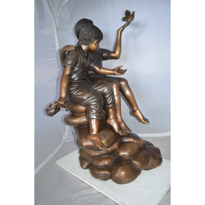 Two Kids on Rocks with a Bird Bronze Statue -  Size: 36"L x 30"W x 44"H.