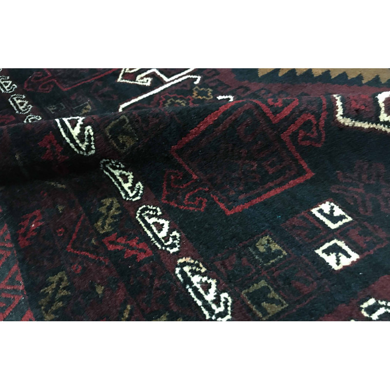 Tapis noir et rouge de haute qualité noué à la main