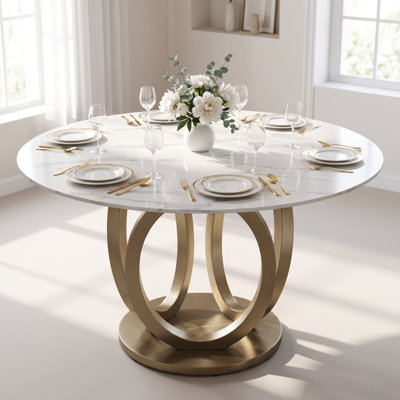 Table de salle à manger ronde de 130 cm en pierre frittée blanche avec pied central ajouré en acier inoxydable couleur champagne doré