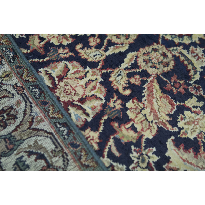 Tapis bleu et ivoire de haute qualité noué à la main