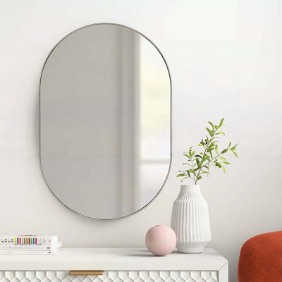Élégant miroir ovale en métal