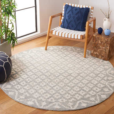 Tapis ivoire / bleu clair Metro 357