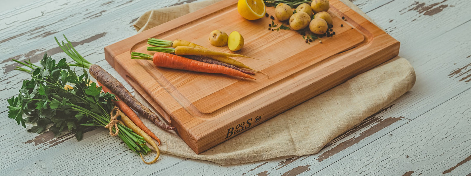 John Boos Medium Maple Wood Reversible Butcher Block Cutting Board, 18 x 12  x 1.25 Inches Thick, Edge Grain, and Integrated Hand Grip, Brown