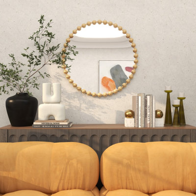 Miroir mural en métal avec détails perlés
