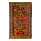 Melaku Oriental Area Rug in Rust