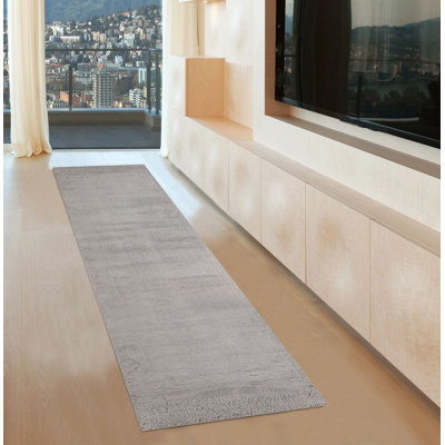 Tapis gris en polyester tissé à la machine Haegan
