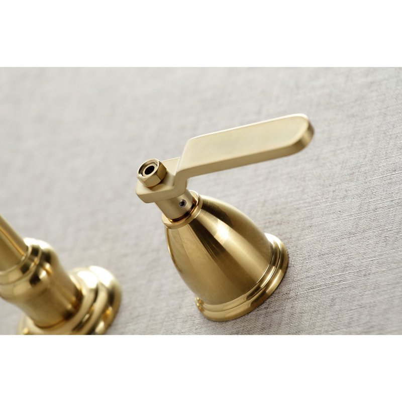 Kingston Brass Whitaker Two-Handle 3-Hole Wall Mount Bathroom Faucet, Brushed Brass