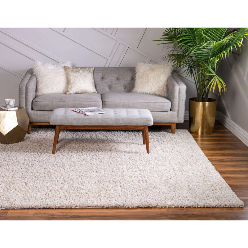 Tapis à poils longs Carlosadrian couleur écorce, Carré 8 pi