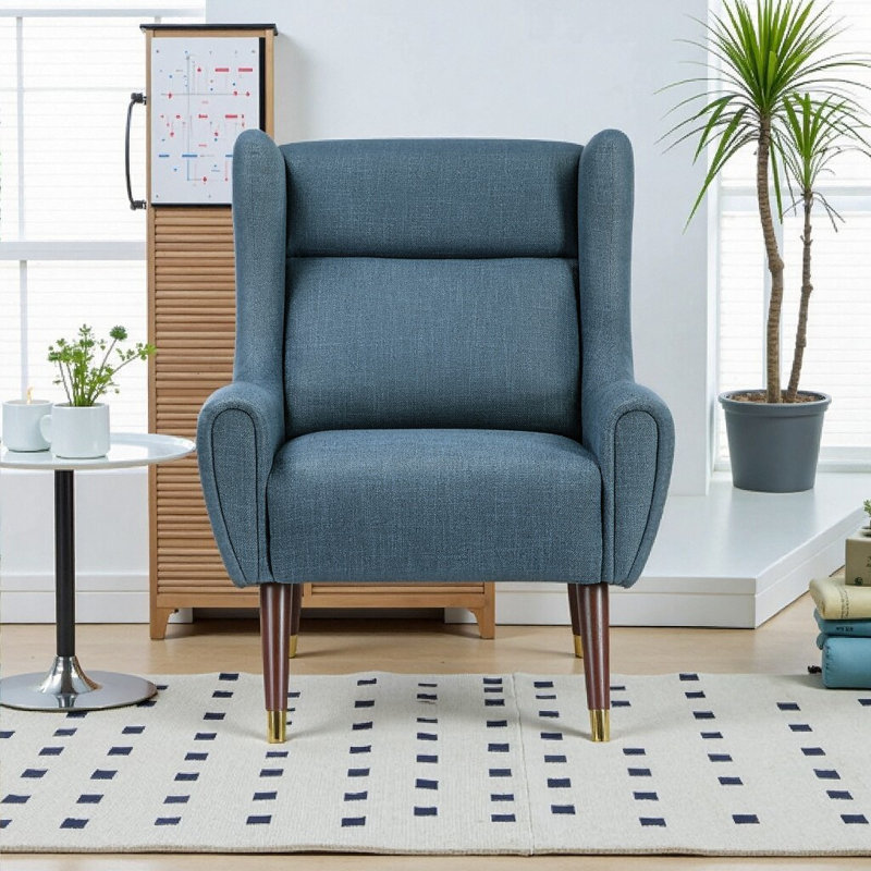 Fauteuil à oreilles moderne avec structure en bois massif, revêtement texturé et ressorts ensachés, design contemporain luxueux