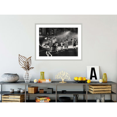 [Children playing in water sprayed from open fire hydrant Upper West Side New York] by Weegee -Framed Giclee Print