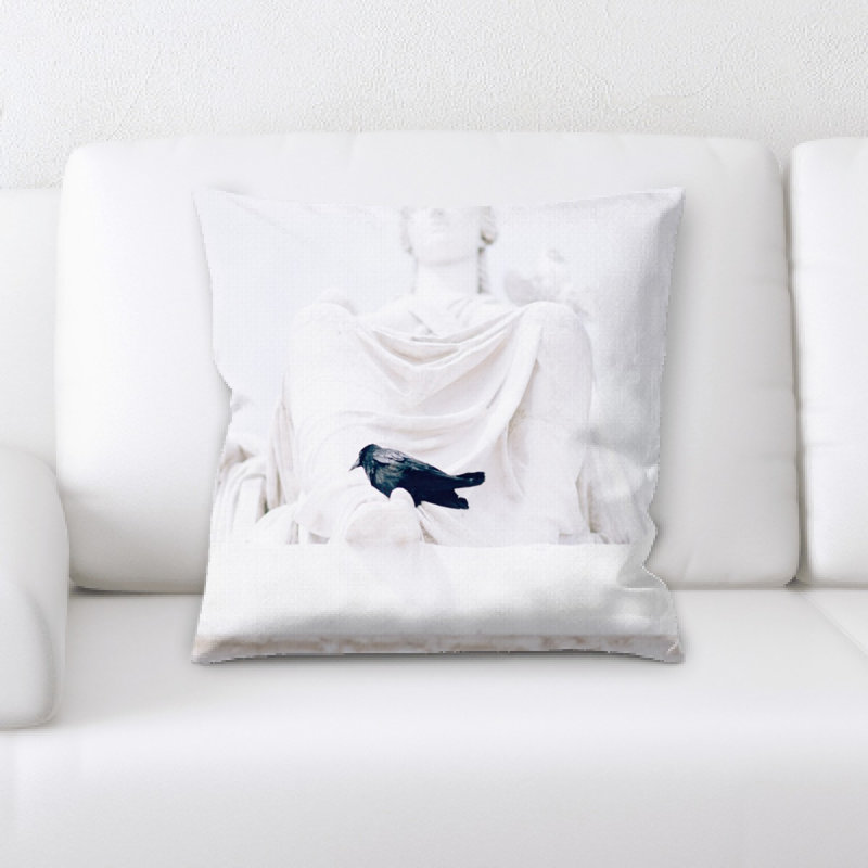 Coussin statue
