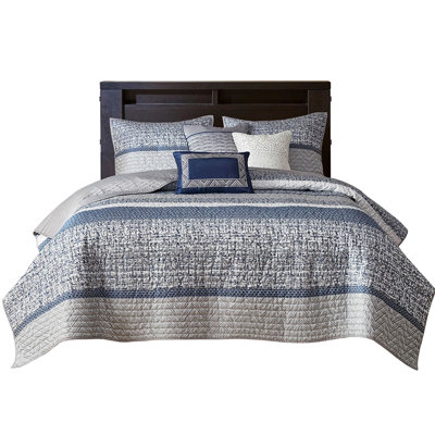 Navy King/ King Reversible Quilt With 6 Pieces. . Decorative Pillows Embroidery. Machine Washable Bedding For A Chic Look . Pieces Pillows. . Embroidery Details.