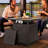 Outdoor 28 Inch 50,000 BTU Propane Gas Iron Fire Pit Table with Cover, Ceramic Tabletop and Iron Frame, Lid and Lava Rocks, for Patio, Deck, Garden, Backyard, Brown and Black