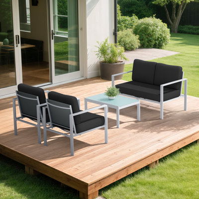Ensemble de meubles de patio à structure en acier avec 2 chaises, 1 causeuse et table basse en verre trempé - Ensemble de conversation extérieur 4 pièces avec coussins en tissu Teslin pour la cour ou le jardin