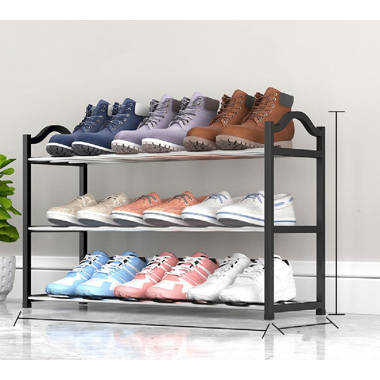 https://assets.wfcdn.com/im/33610319/resize-h380-w380%5Ecompr-r70/2161/216161191/9+Pair+Shoe+Rack.jpg