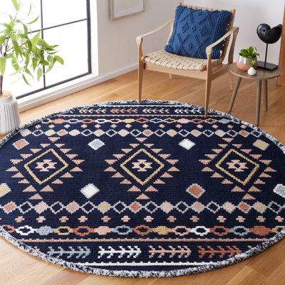 Baston Southwestern Navy/Orange/White Area Rug